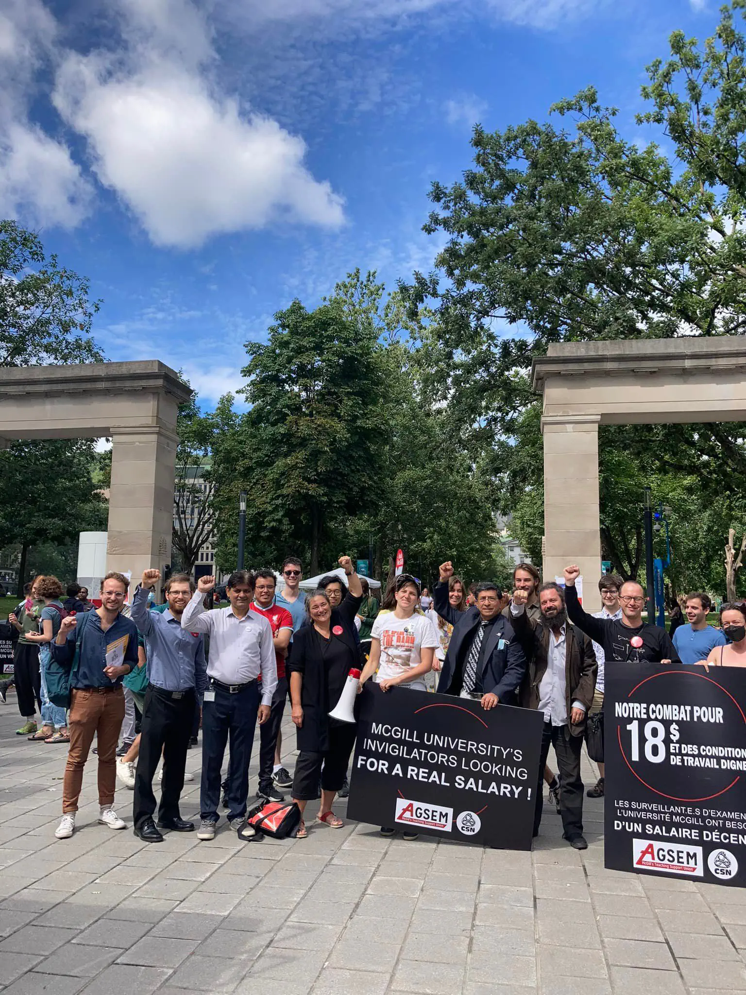 Photo of AGSEM organizers and rally in support of invigilator negotiations. After this rally, McGill returned to the negotiation table with a serious monetary offer, and an agreement between AGSEM and the employer was reached (September 1, 2022).